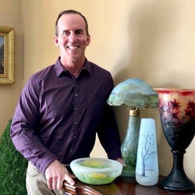 George Sorensen displaying art glass